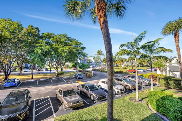 a view of a cars parked in front of a building