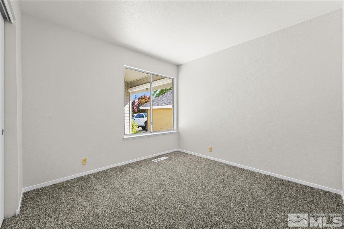 5154 Aspen View Drive Reno, NV 89523 - Photo 14 of 23 an empty room with windows