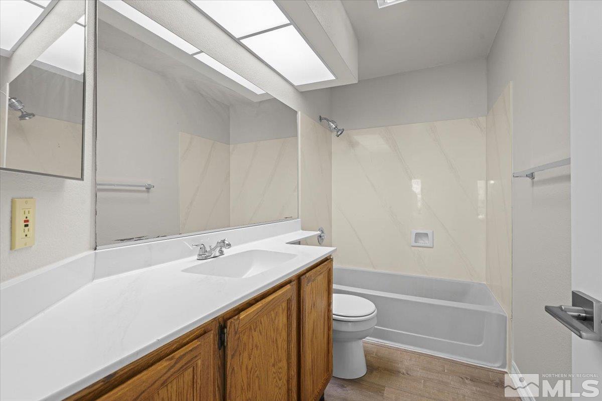 5154 Aspen View Drive Reno, NV 89523 - Photo 15 of 23 a bathroom with a sink a toilet and shower