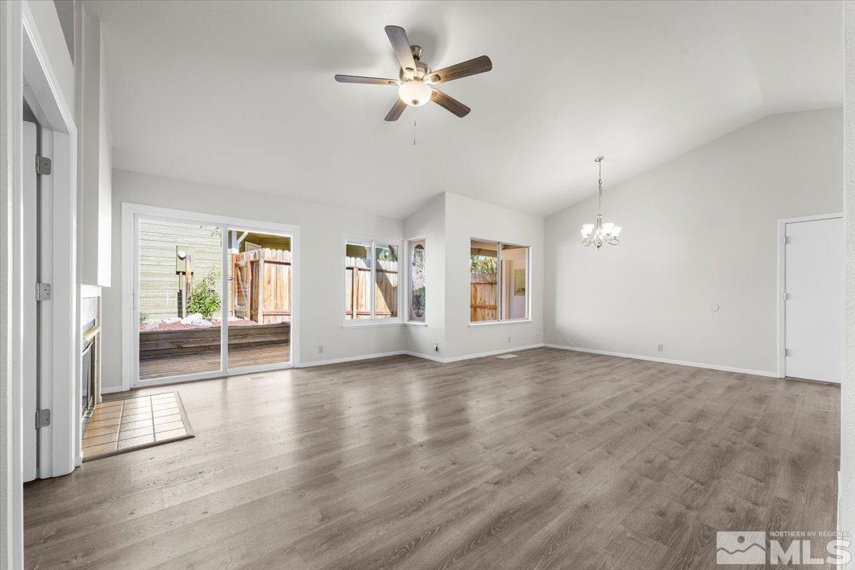 5154 Aspen View Drive Reno, NV 89523 - Photo 19 of 23 a view of an empty room with window and wooden floor