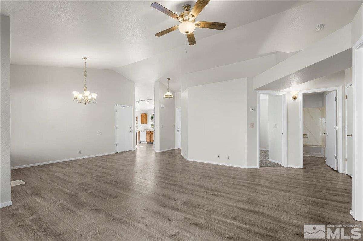 5154 Aspen View Drive Reno, NV 89523 - Photo 4 of 23 wooden floor in an empty room with a window