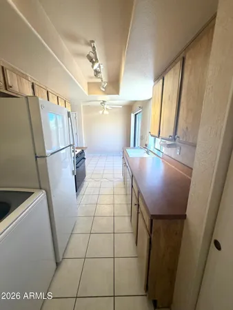 a bathroom with a sink vanity and a mirror