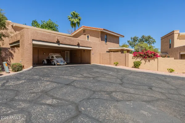 a front view of a house with yard