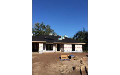 88462 Maybourne Road Yulee, FL 32097 - Photo 2 of 3 a front view of a house with a yard