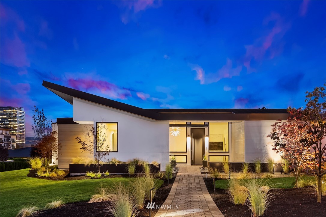 1043 Belfair Road Bellevue, WA 98004 - Photo 1 of 1 a front view of a house with a yard