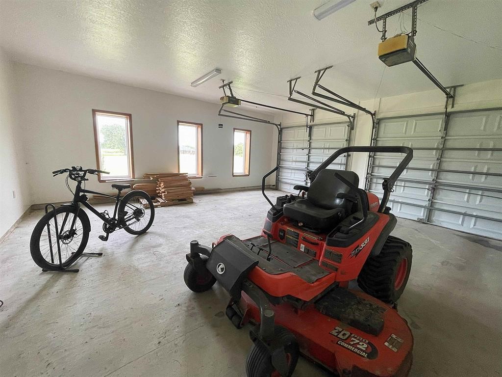 13979 Shellhammer Road Winnie, TX 77665 - Photo 37 of 47 a view of a room with gym equipment