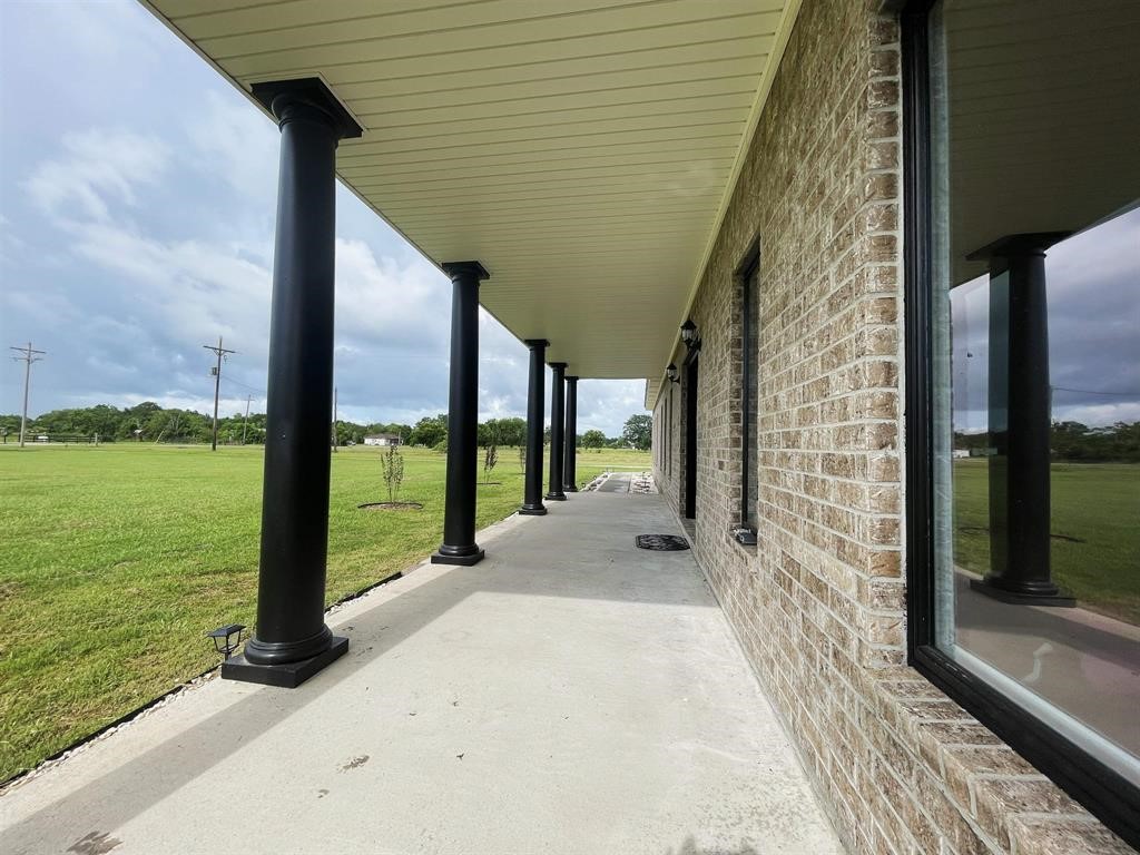 13979 Shellhammer Road Winnie, TX 77665 - Photo 41 of 47 a view of a garden from a balcony