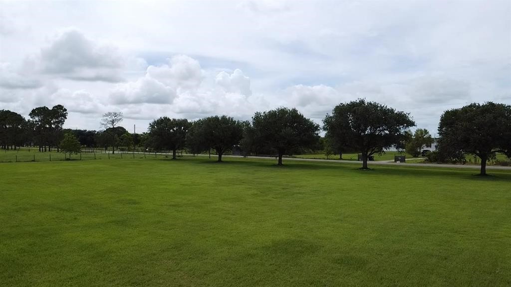 13979 Shellhammer Road Winnie, TX 77665 - Photo 47 of 47 a view of a golf course