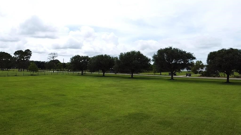 13979 Shellhammer Road Winnie, TX 77665 - Photo 7 of 47 a view of a golf course