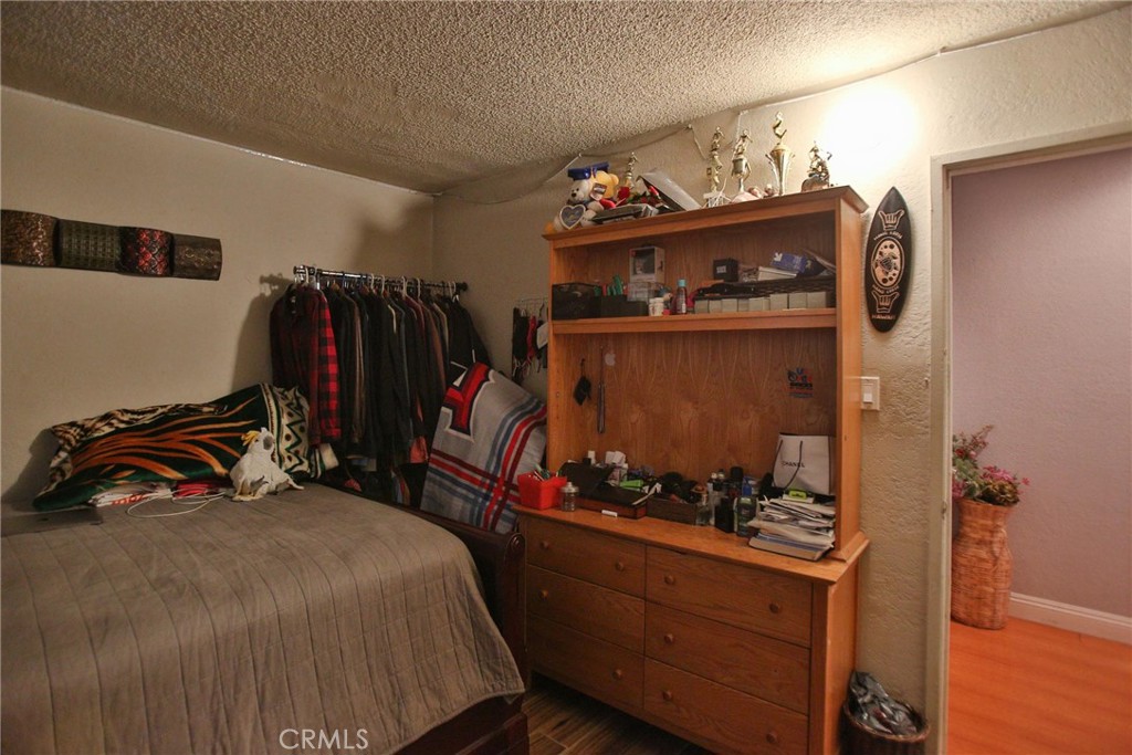 2525 West 10th Street Santa Ana, CA 92703 - Photo 15 of 37 a bed room with a bed and a bed
