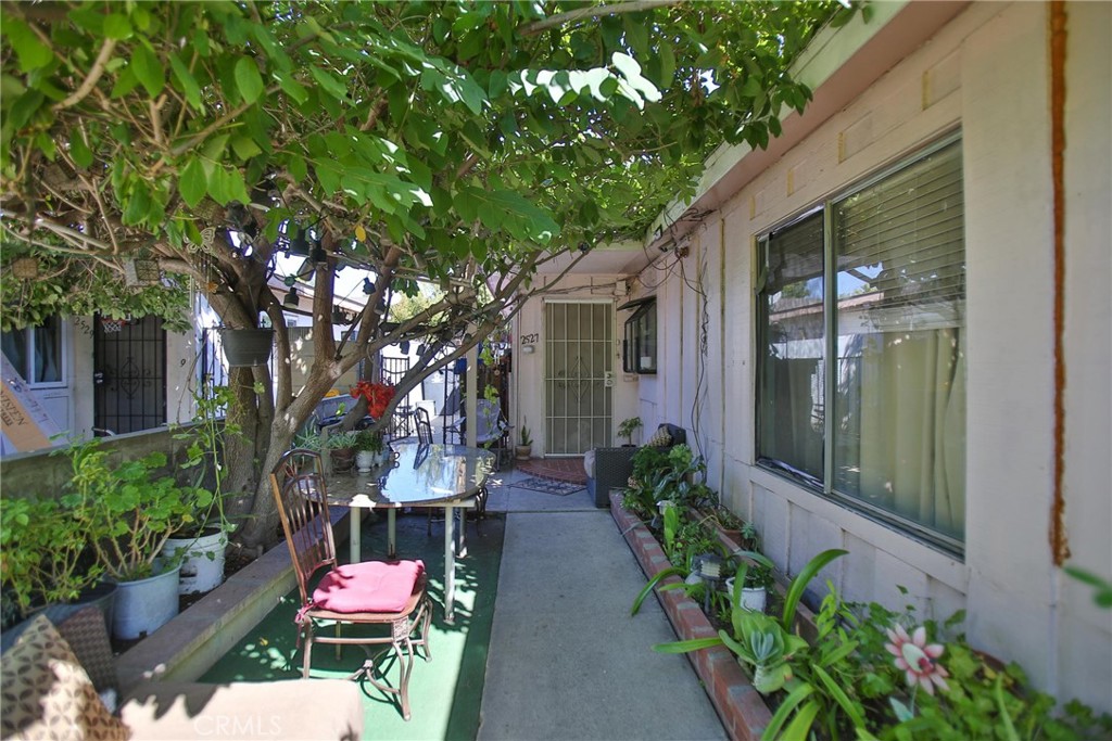 2525 West 10th Street Santa Ana, CA 92703 - Photo 20 of 37 a front view of a house with garden