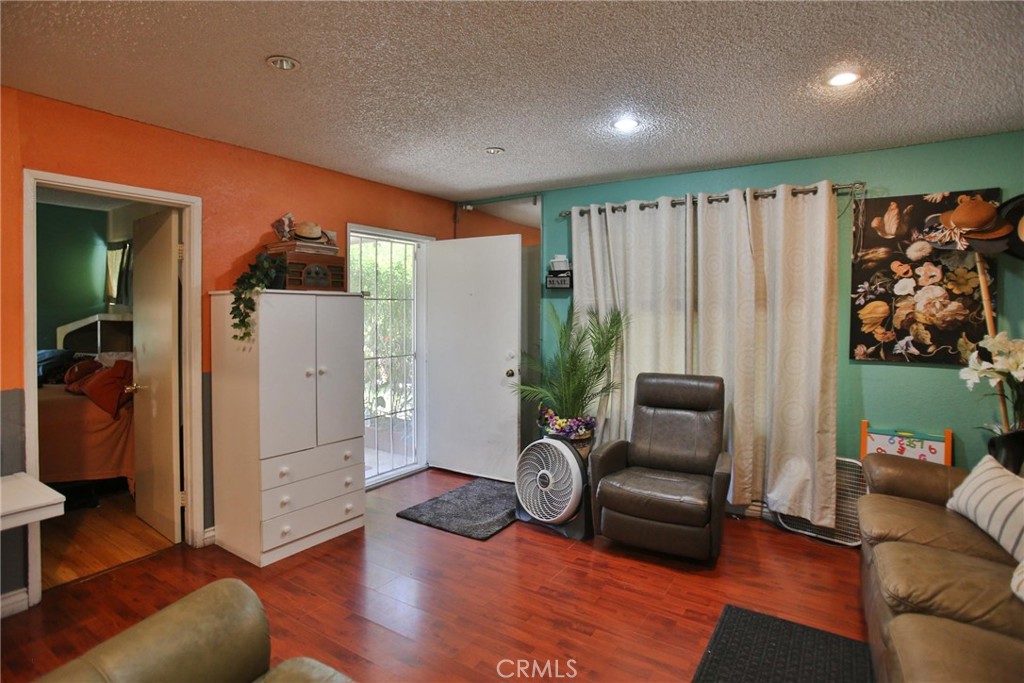 2525 West 10th Street Santa Ana, CA 92703 - Photo 22 of 37 a living room with furniture and a large window