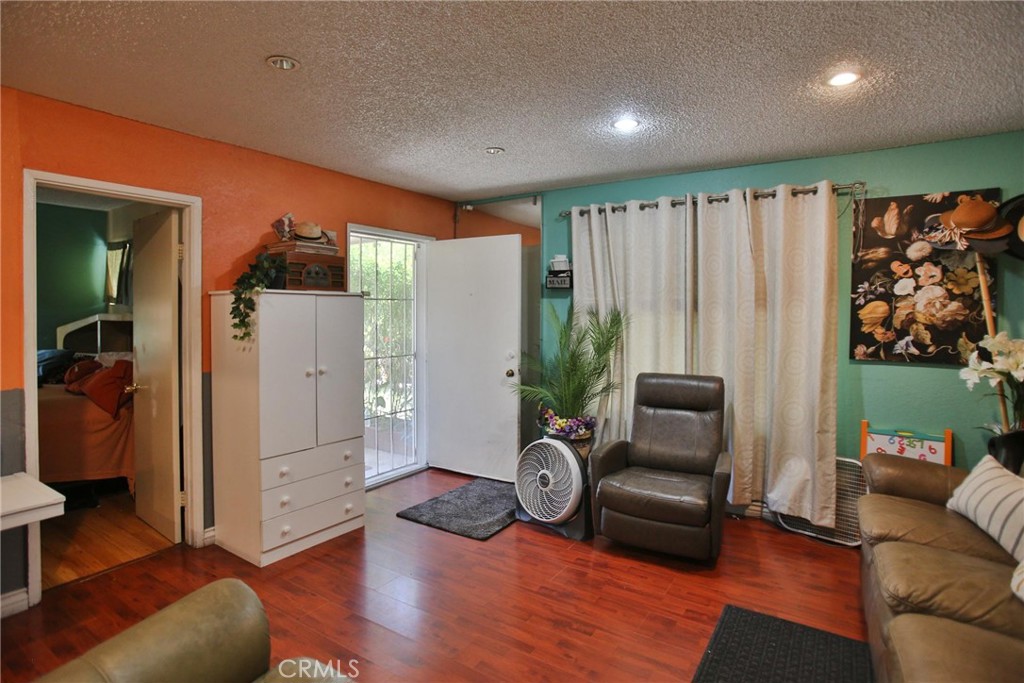 2525 West 10th Street Santa Ana, CA 92703 - Photo 25 of 37 a living room with furniture and a large window