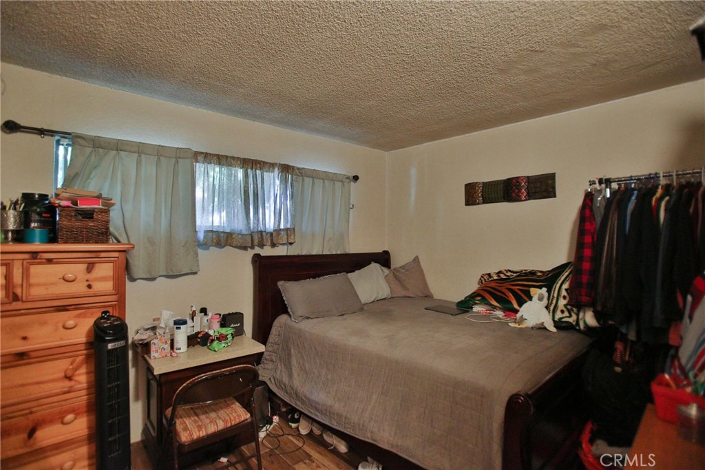 2525 West 10th Street Santa Ana, CA 92703 - Photo 28 of 37 a bedroom with a bed and a closet