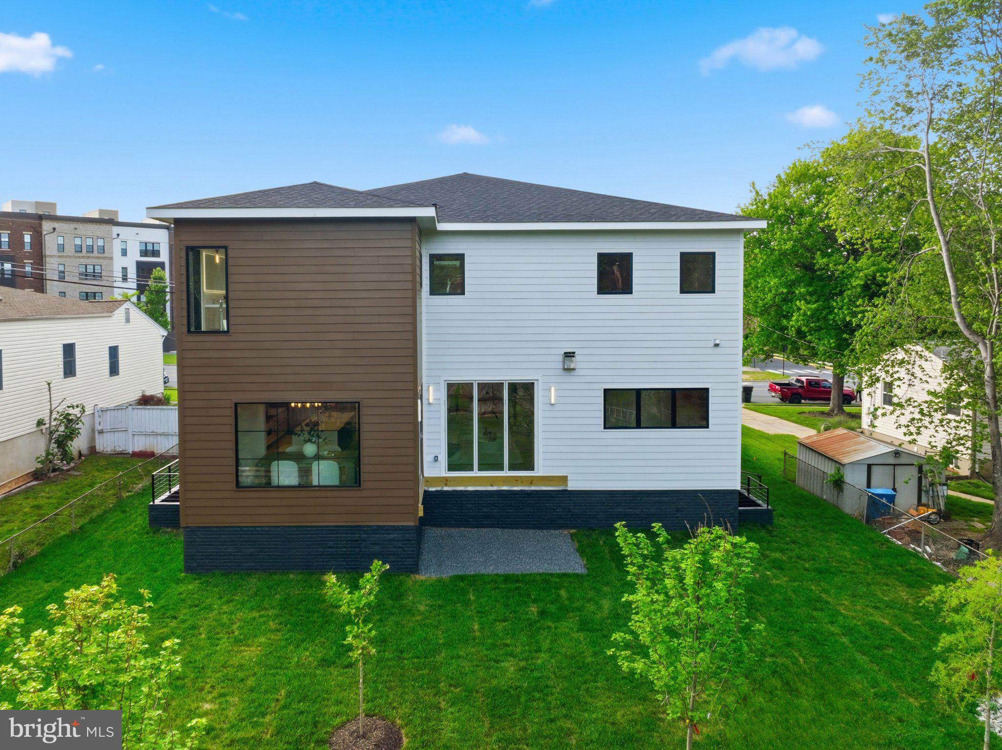 7421 Magarity Road Falls Church, VA 22043 - Photo 61 of 66 Modern home with lush green yard.