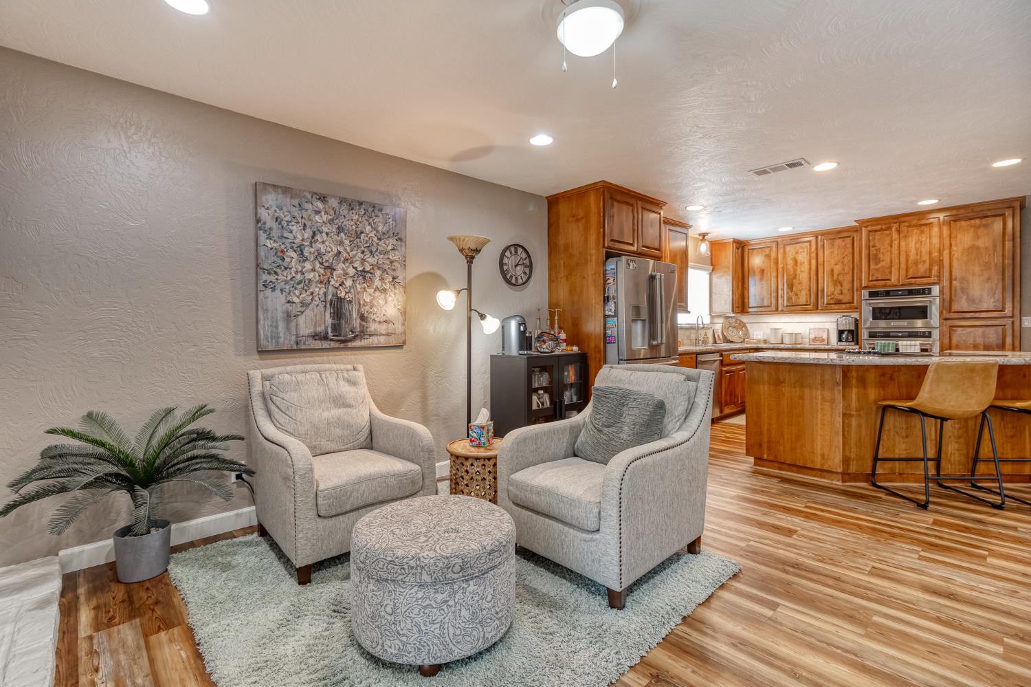 1512 Kruger Drive Modesto, CA 95355 - Photo 19 of 33 a living room with furniture kitchen view and a large window