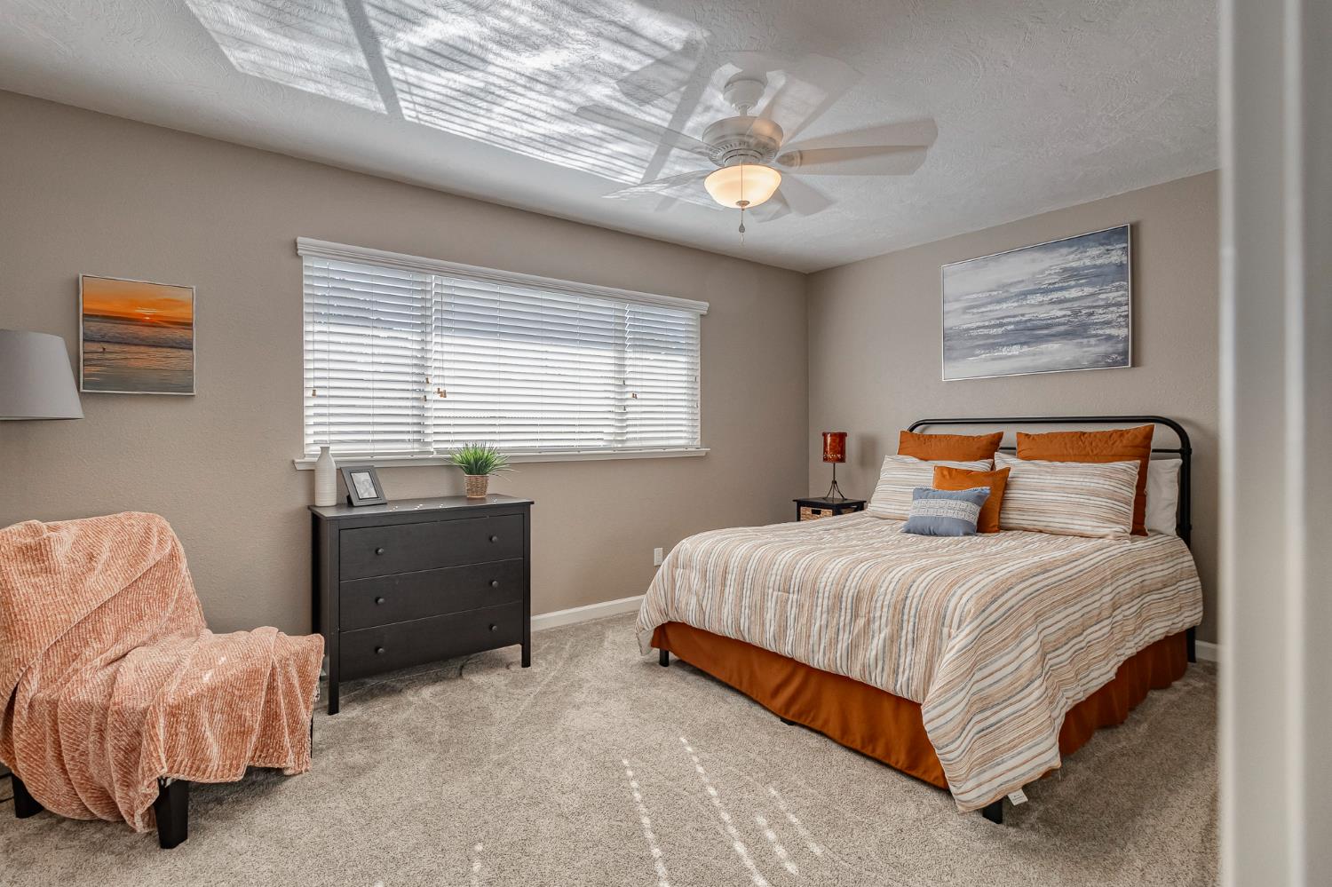 1512 Kruger Drive Modesto, CA 95355 - Photo 22 of 33 a bedroom with a bed and a couch