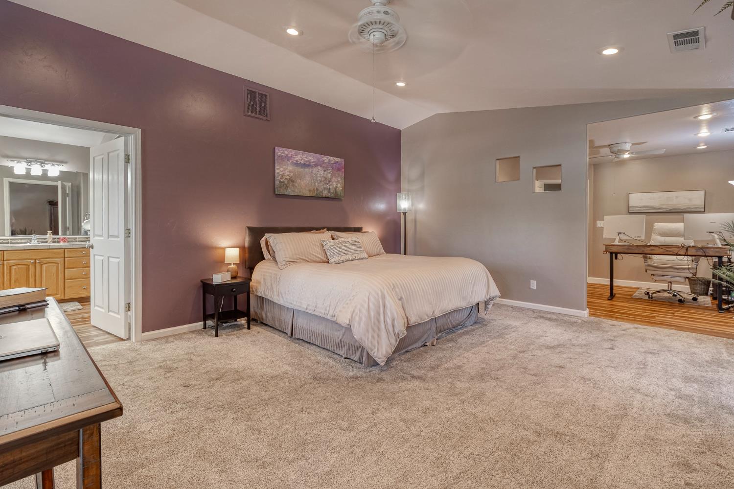 1512 Kruger Drive Modesto, CA 95355 - Photo 30 of 33 a bedroom with a bed and a view of living room