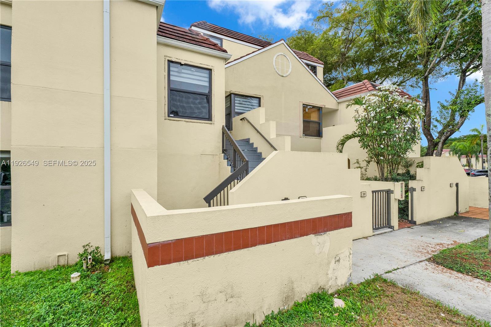 13028 Southwest 88th Lane, Unit A205 Miami, FL 33186 - Photo 2 of 37 a view of an outdoor space