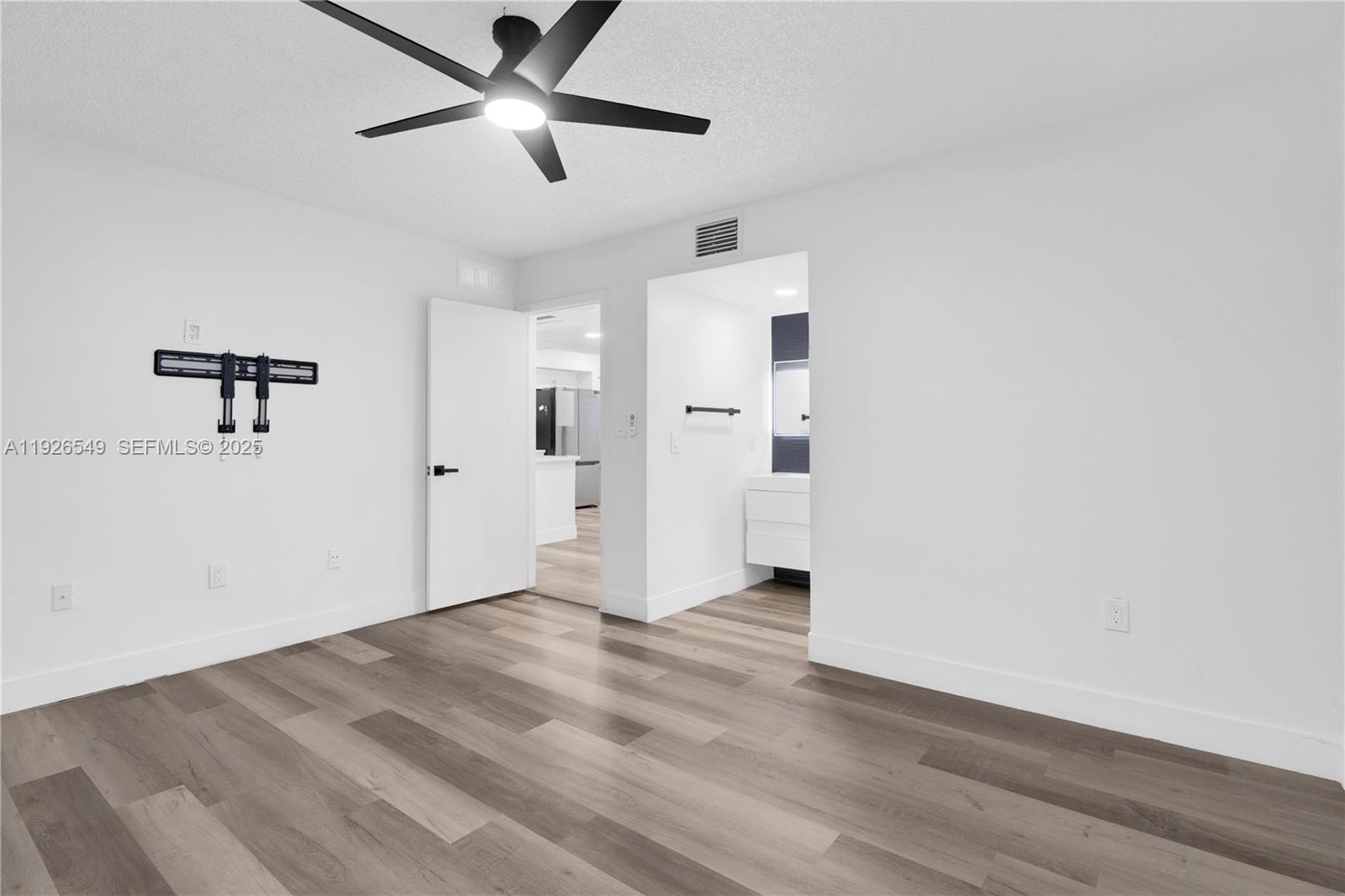 13028 Southwest 88th Lane, Unit A205 Miami, FL 33186 - Photo 23 of 37 a view of an empty room