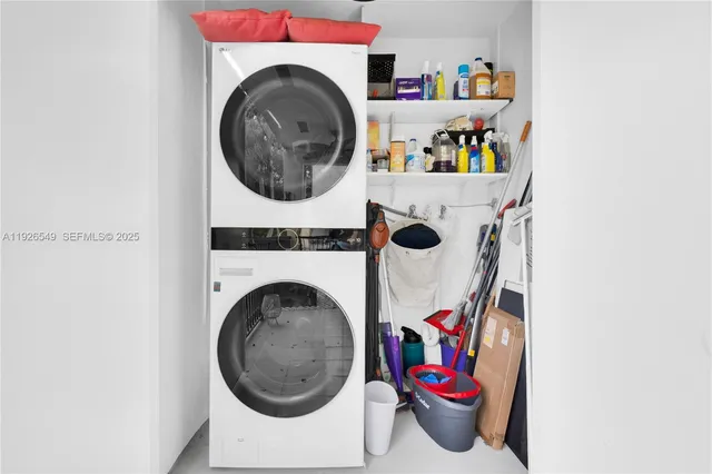 a utility room with dryer and washer