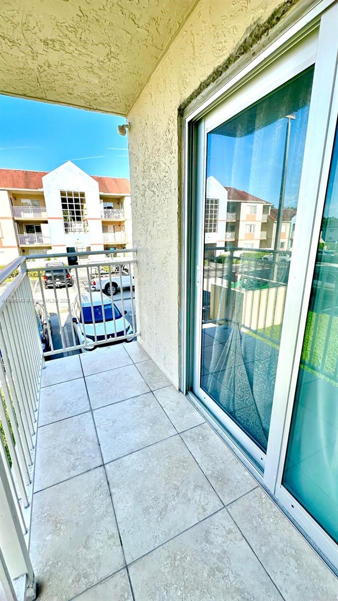 18880 Northwest 57th Avenue, Unit 208 Hialeah, FL 33015 - Photo 28 of 28 a view of storage and utility room