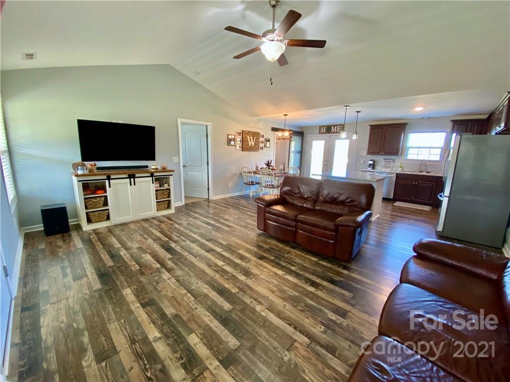 6316 Bill Sain Road Vale, NC 28168 - Photo 12 of 15 a living room with furniture and a flat screen tv