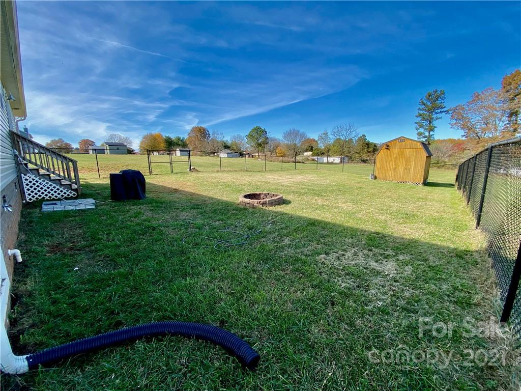 6316 Bill Sain Road Vale, NC 28168 - Photo 14 of 15 a view of a lake with a yard