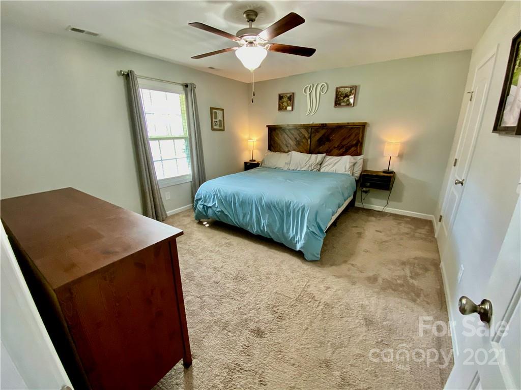 6316 Bill Sain Road Vale, NC 28168 - Photo 5 of 15 a bedroom with a bed and a window