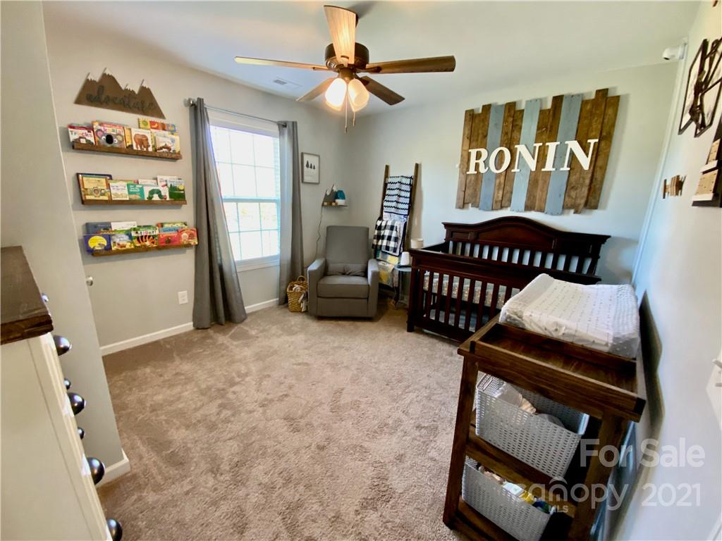 6316 Bill Sain Road Vale, NC 28168 - Photo 7 of 15 a bedroom with furniture and a window