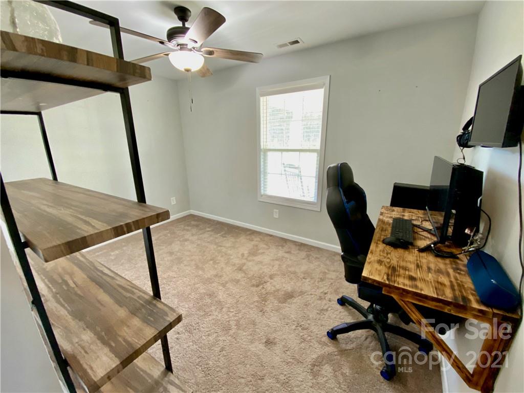 6316 Bill Sain Road Vale, NC 28168 - Photo 9 of 15 a view of a workspace with furniture and a window