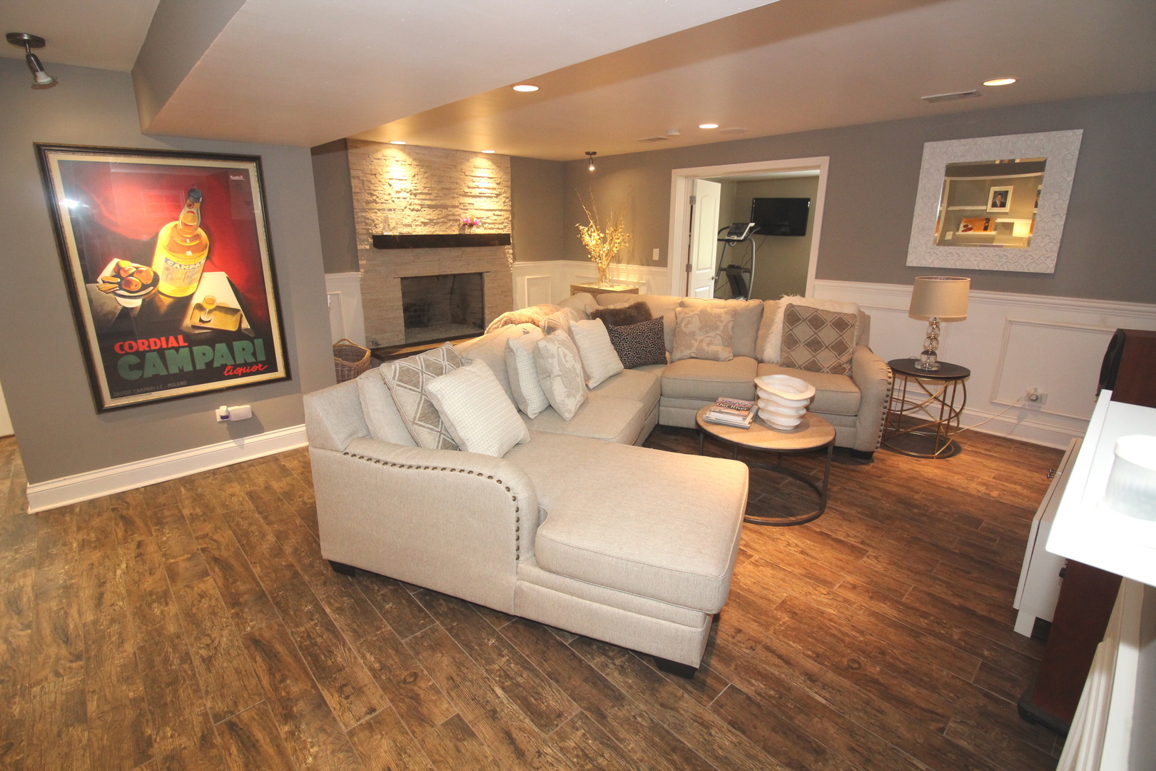 913 Surrey Road Addison, IL 60101 - Photo 14 of 44 a living room with furniture kitchen view and a fireplace