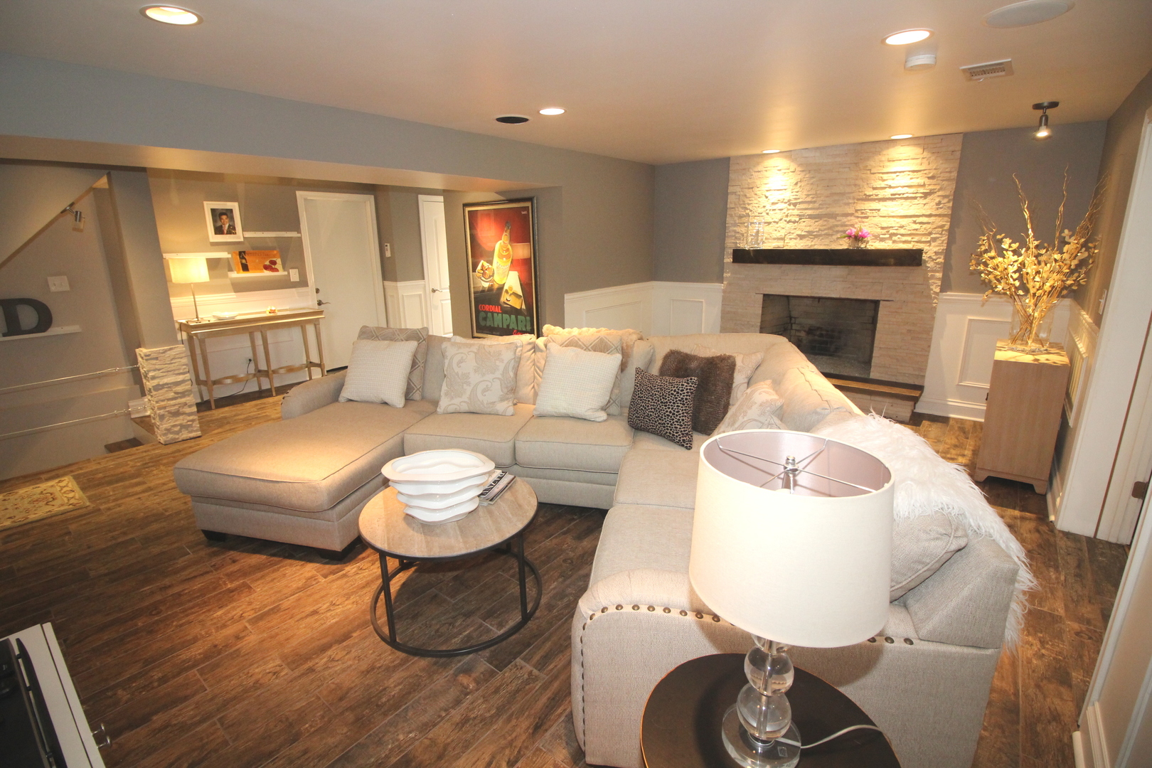 913 Surrey Road Addison, IL 60101 - Photo 15 of 44 a living room with furniture a window and a fireplace