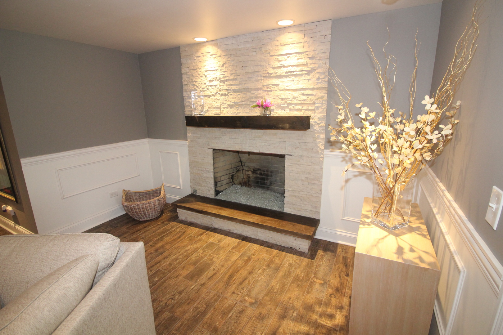 913 Surrey Road Addison, IL 60101 - Photo 16 of 44 a living room with furniture and a fireplace