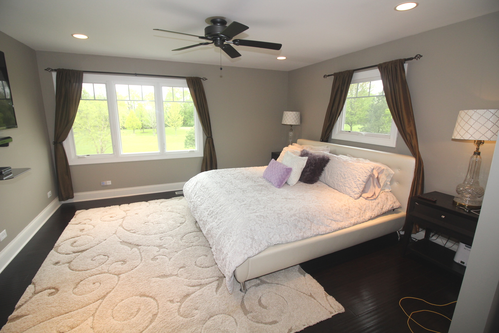 913 Surrey Road Addison, IL 60101 - Photo 17 of 44 a bedroom with a large bed and a window