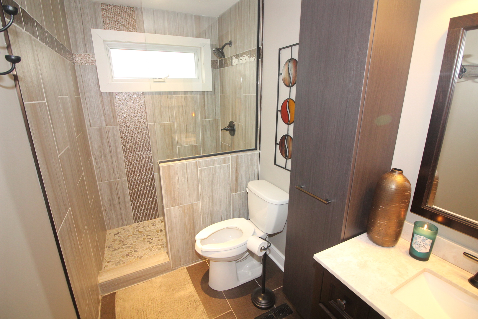 913 Surrey Road Addison, IL 60101 - Photo 28 of 44 a bathroom with a sink and a mirror