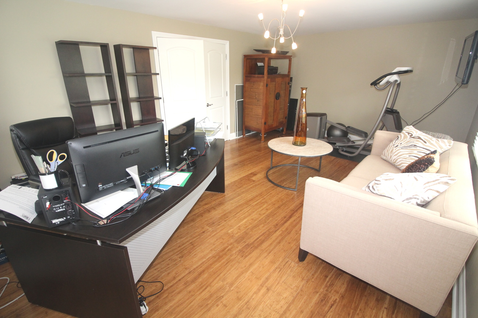 913 Surrey Road Addison, IL 60101 - Photo 29 of 44 a living room with furniture and a chandelier
