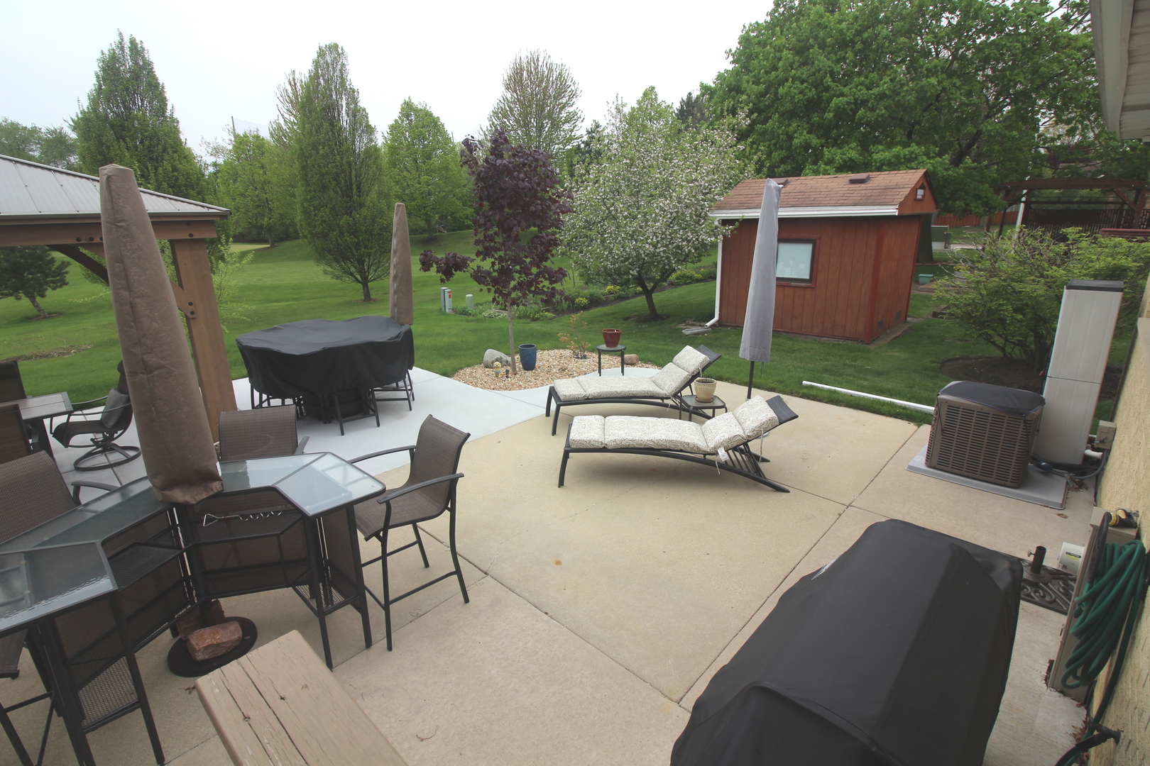 913 Surrey Road Addison, IL 60101 - Photo 40 of 44 a view of a patio with a yard