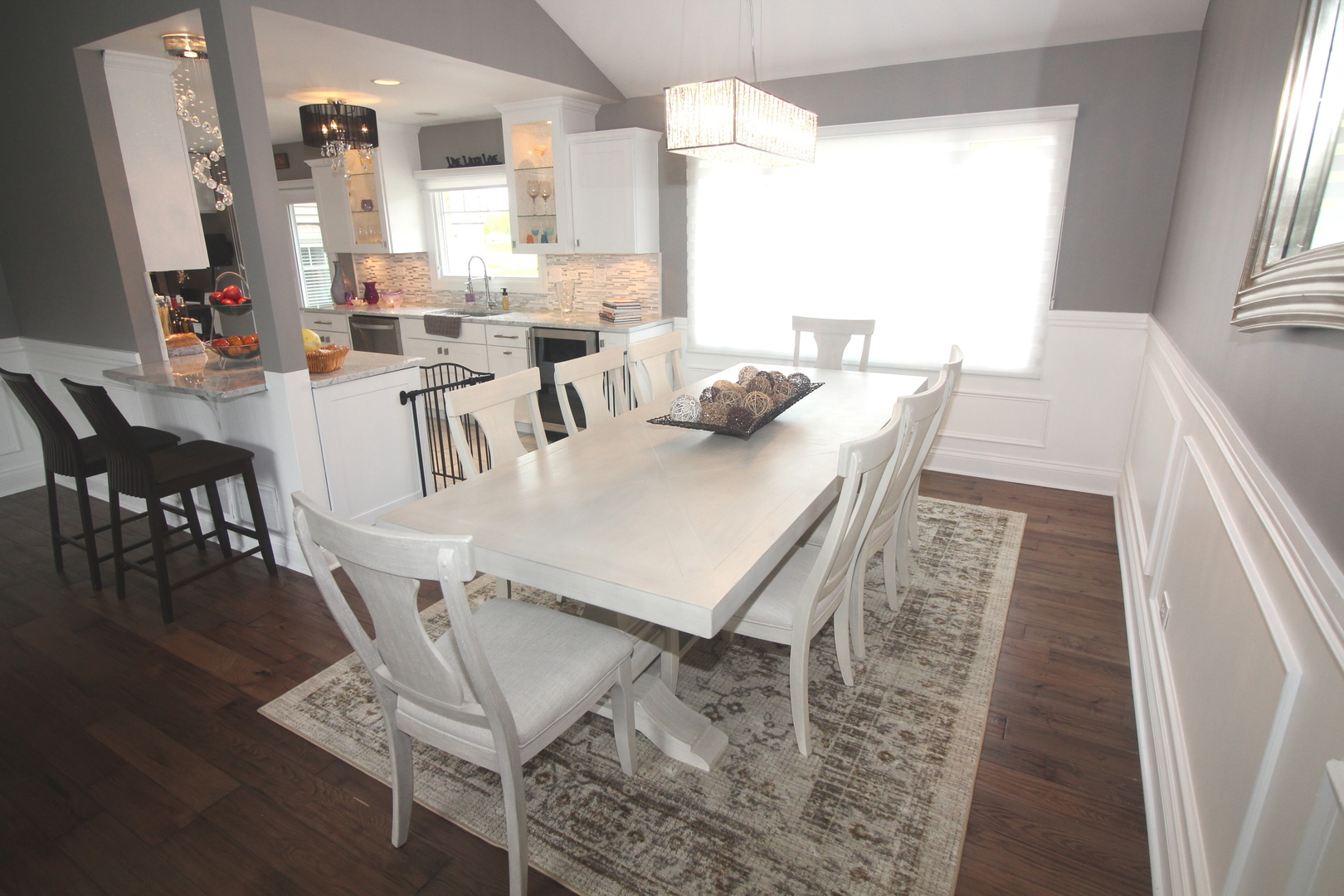 913 Surrey Road Addison, IL 60101 - Photo 8 of 44 a view of a dining room with furniture and wooden floor