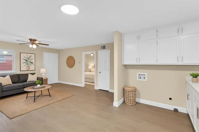a view of livingroom with furniture and windows