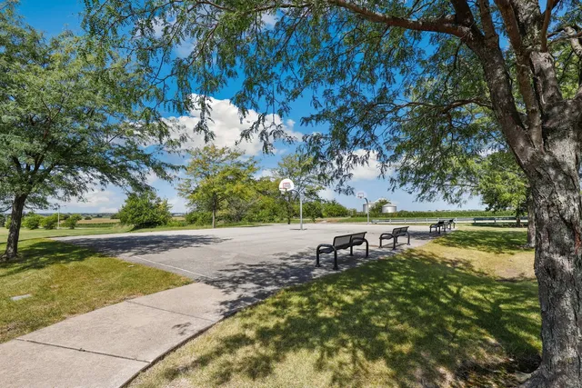 a view of a lake with a yard