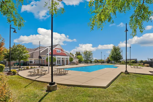 a view of a playground with basketball court
