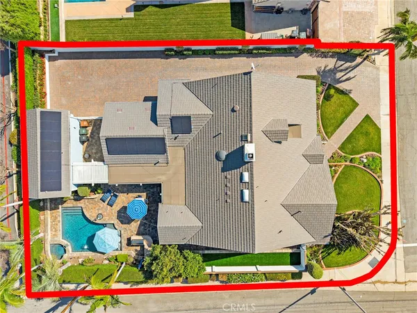 an aerial view of residential building with outdoor space