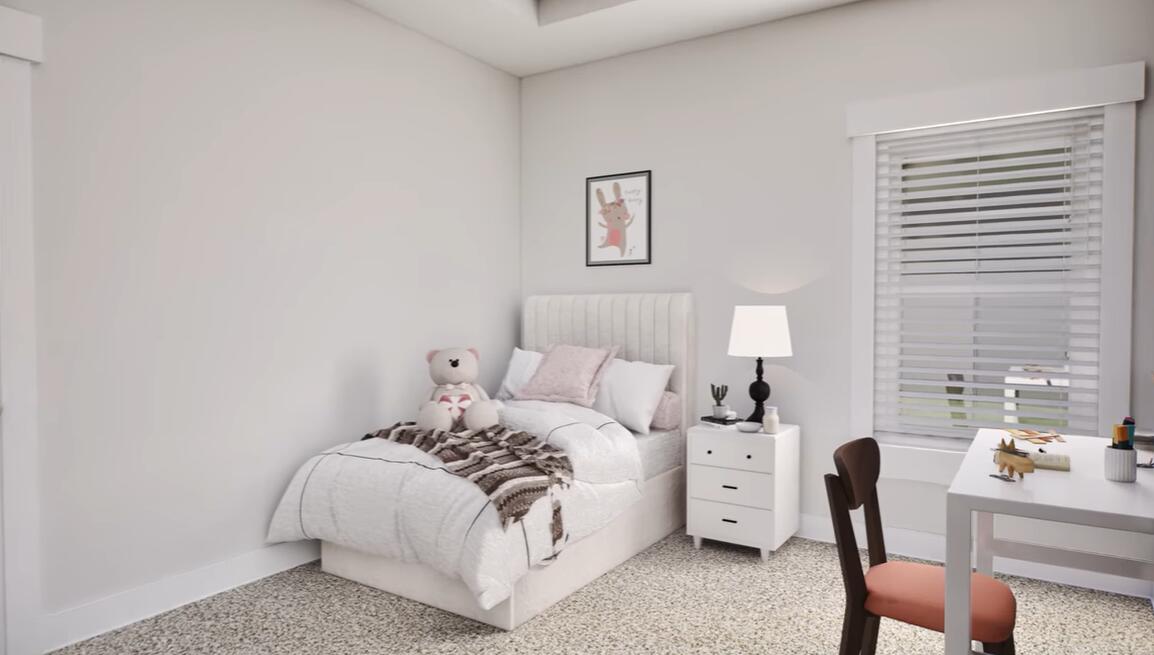 542 Staggerbush Street Freeport, FL 32439 - Photo 15 of 26 a bedroom with a bed and a chair
