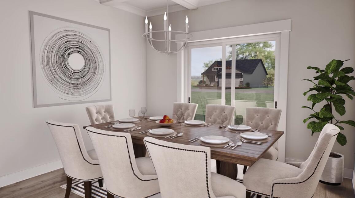 542 Staggerbush Street Freeport, FL 32439 - Photo 10 of 26 a view of a dining room with furniture window and wooden floor