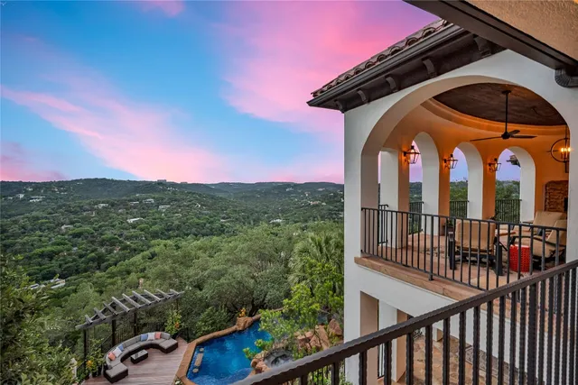 a view of a brick house with a large windows