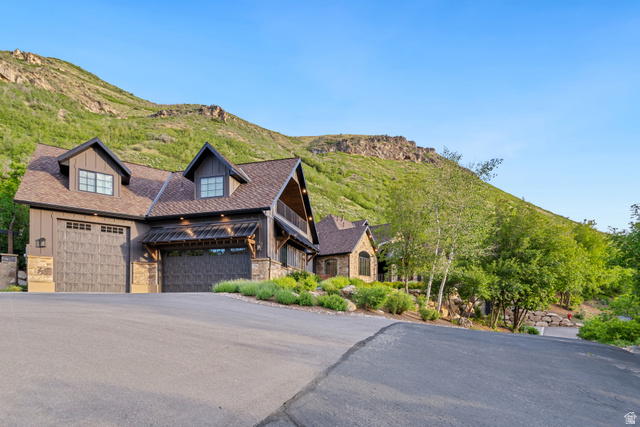 1141 South Oak Leaf Lane Springville, UT 84663 - Photo 3 of 147 Craftsman-style home featuring a prominent gabled roofline and stone and wood siding