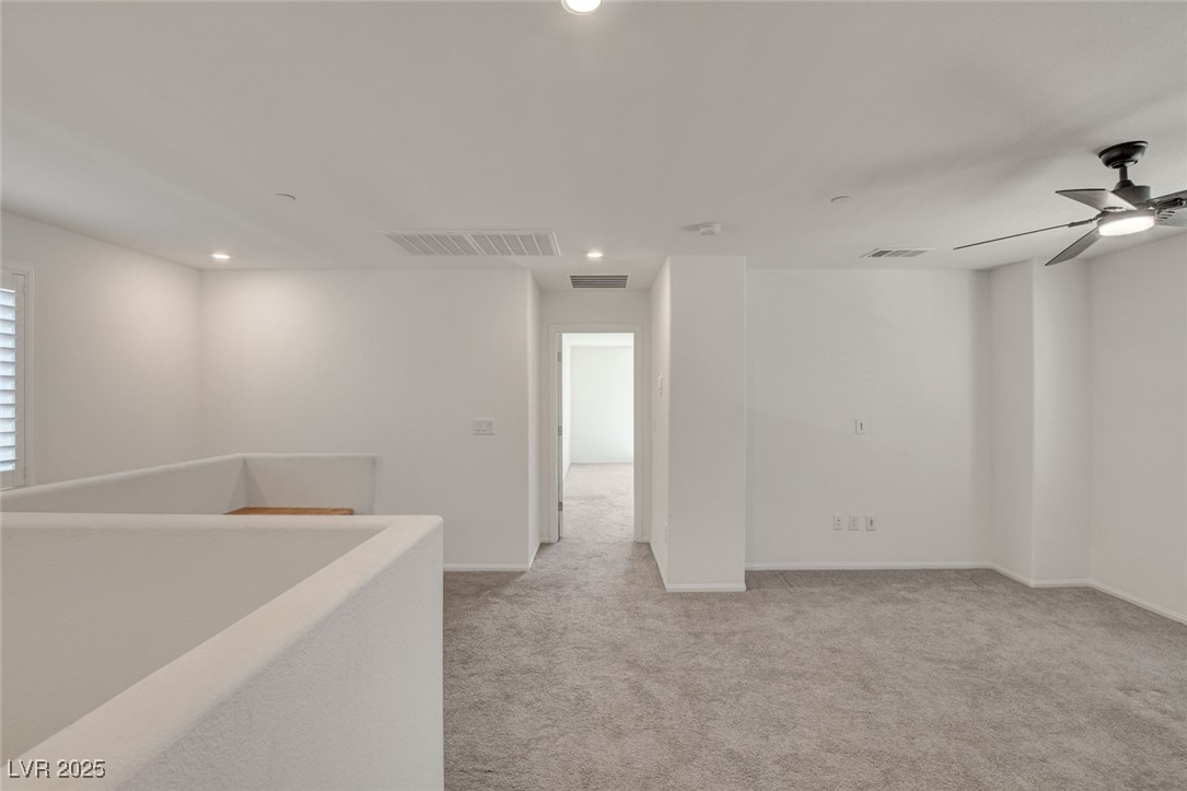 1360 Cerulean Avenue Henderson, NV 89002 - Photo 31 of 62 Spare room featuring light carpet, recessed lighting, and a ceiling fan