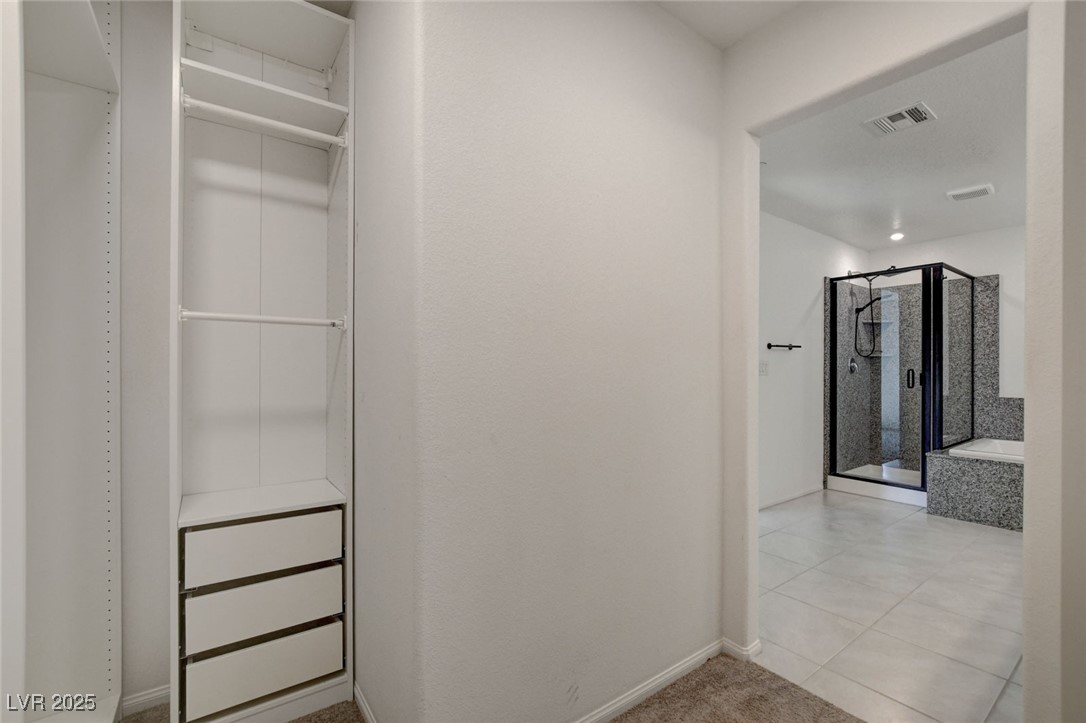 1360 Cerulean Avenue Henderson, NV 89002 - Photo 40 of 62 Hall featuring light tile patterned floors and light colored carpet