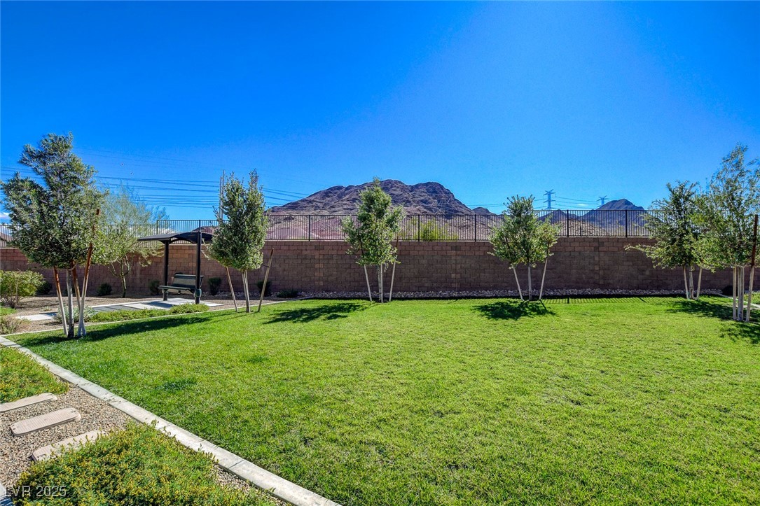 1360 Cerulean Avenue Henderson, NV 89002 - Photo 61 of 62 Fenced backyard featuring a mountain view